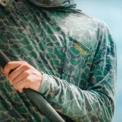 Men's Marsh Wear Mallard Pamlico Long Sleeve Performance Shirt -Chubbies Store mens marsh wear long sleeve mallard pamlico shirt MWK2026 GRCAMO green camo front pocket closeup 13525.1661875325